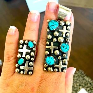 Navajo sterling silver chimney butte turquoise pendant